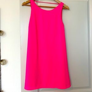 Sleeveless and backless hot pink slip dress